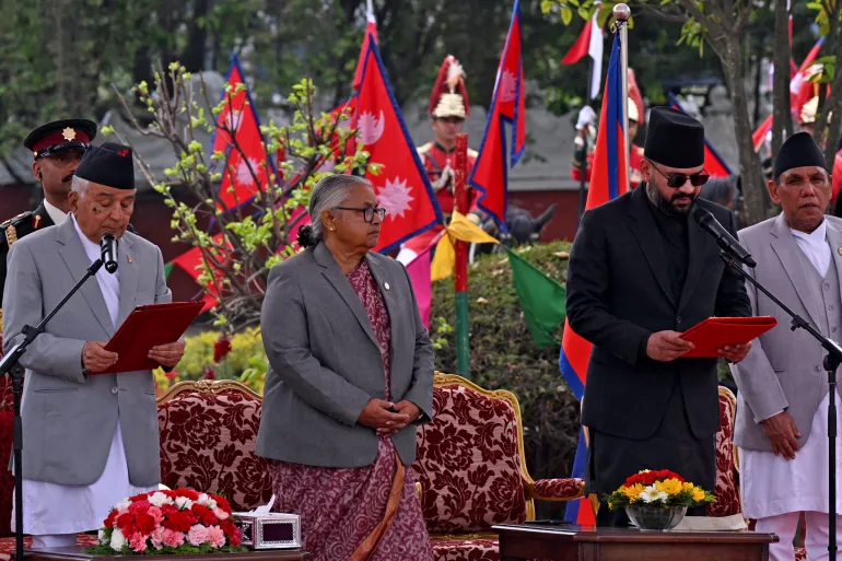 Nepal swears in youngest prime minister after rap-fueled rise
