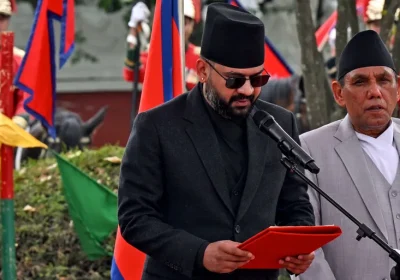 Nepal swears in youngest prime minister after rap-fueled rise