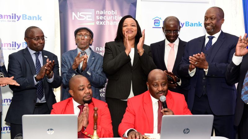 NSE CEO Frank Mwiti, Family Bank Founder T.K. Muya, CEO Nancy Njau, CBK Chair Andrew Musangi & NSE Chair Kiprono Kittony join Brian Mutunga & Tony Waweru during the listing of the bank’s shares on NSE by way of introduction where the shares opened trading at Ksh.22.58 per share above the introductory price of KSh 18.00.