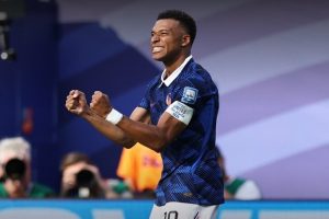 Mbappe and Deschamps enter history books despite France defeat