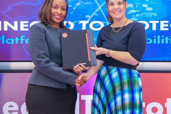 Njeri Jomo, Jubilee Health CEO(left) and Benta Krogman( right) during the signing ceremony.