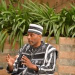 Activist Ayo Kimathi speaking in Nairobi about concerns over the US Global Health Strategy in Africa.